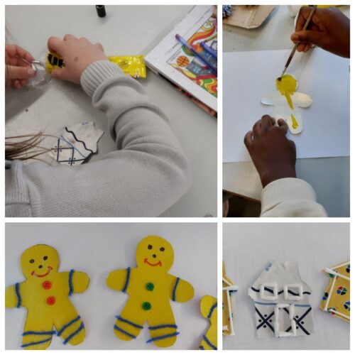 Os alunos a pintar os efeitos decorativos da Árvore Natal Amarela.