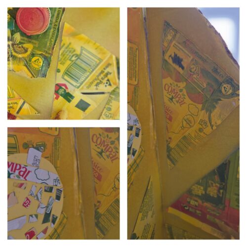 Detalhes dos símbolos Tetra Pak e Compal na árvore Amarela e nos efeitos da Árvore