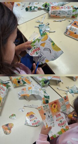 Alunos do 3º ano, recortaram corações das embalagens Tetra pak da marca Compal.