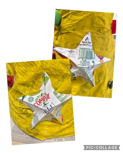 Utilização das embalagens de sumo compal para elaborar os adereços da árvore de natal.