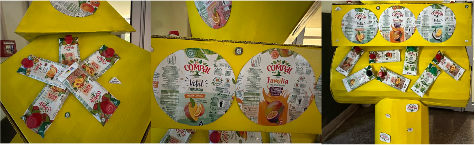 Destaque da árvore de Natal, evidenciando a decoração com embalagens Compal e a presença dos logótipos da Tetra Pak e da Compal