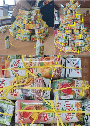 A montagem da arvore foi feita de forma a que:<br/>- os símbolos Tetra Pak ficassem visíveis nos fundos de pacotes que ficam voltados para o lado de fora;<br/>- o nome Compal é visível em todos os pacotes que constituem a árvore.