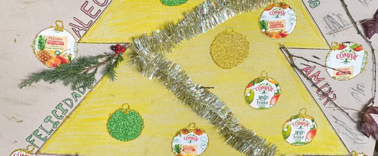 Símbolos Tetra Pak e Compal visíveis no projeto do Natal amarelo