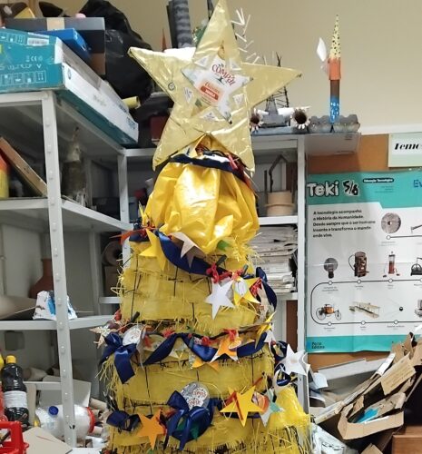 Estrela com os símbolos da Compal e Tetra Pak